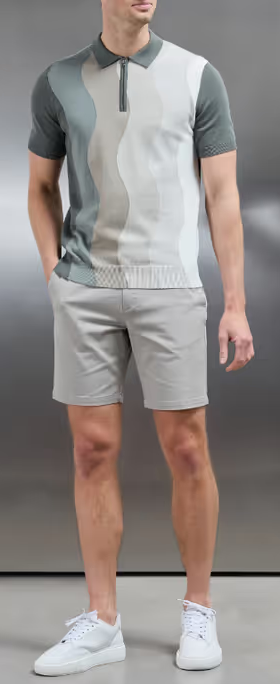 A man wearing arne wave knitted zip polo shirt - sage