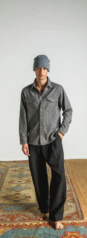 A man wearing Otherwise swanson overshirt in grey
