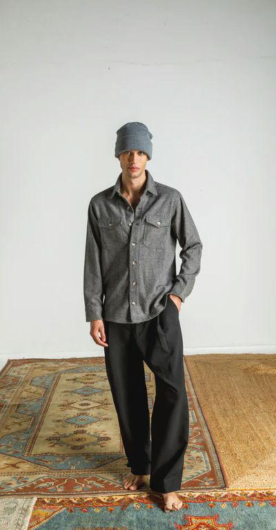 A man wearing Otherwise swanson overshirt in grey