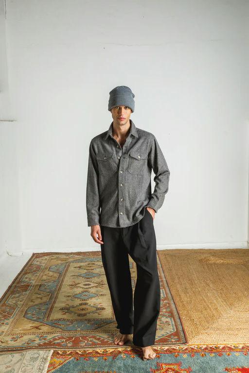 A man wearing Otherwise swanson overshirt in grey
