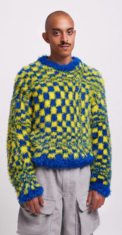 A man wearing HIBU lisbon handmade 2020vision knit jumper