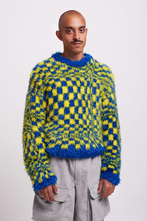 A man wearing HIBU lisbon handmade 2020vision knit jumper