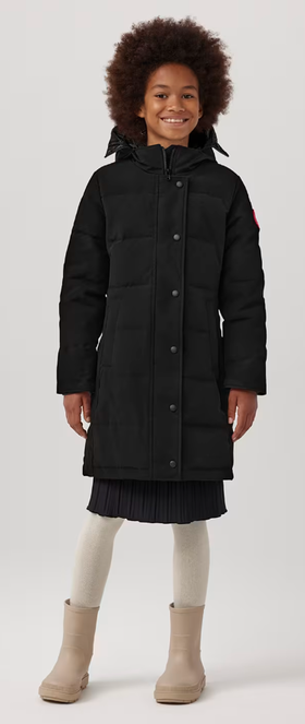 A girl wearing Canada Goose Baby youth juniper parka - black