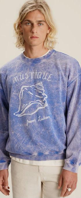 A man wearing Mustique buzio crewneck sweater