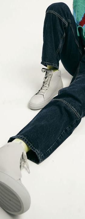 A man wearing DiVERGE v24 pastel green floater sneaker