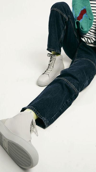 A man wearing DiVERGE v24 pastel green floater sneaker