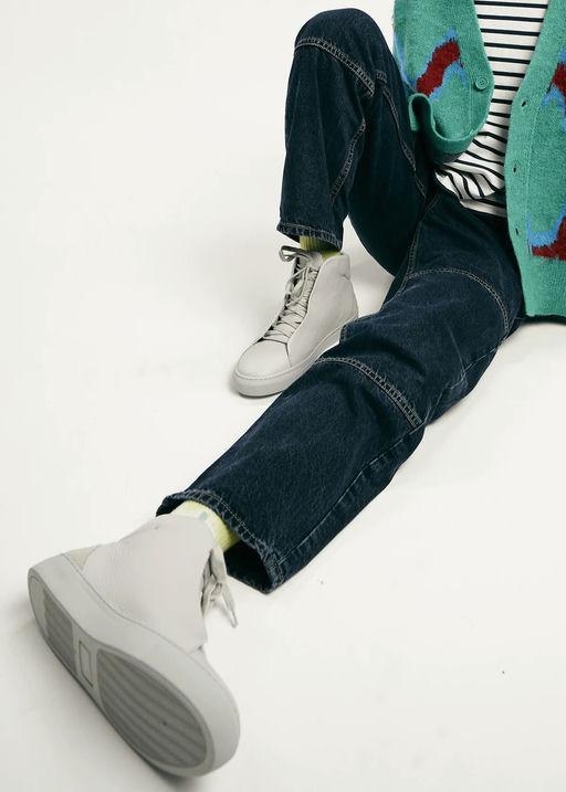 A man wearing DiVERGE v24 pastel green floater sneaker