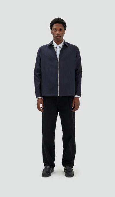 A man wearing Fairly Normal zipper overshirt black