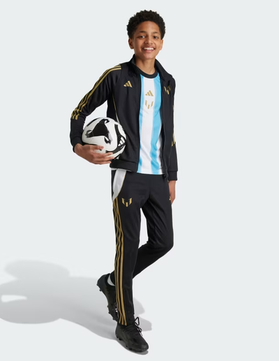 A kid wearing Adidas Kids messi track suit jacket