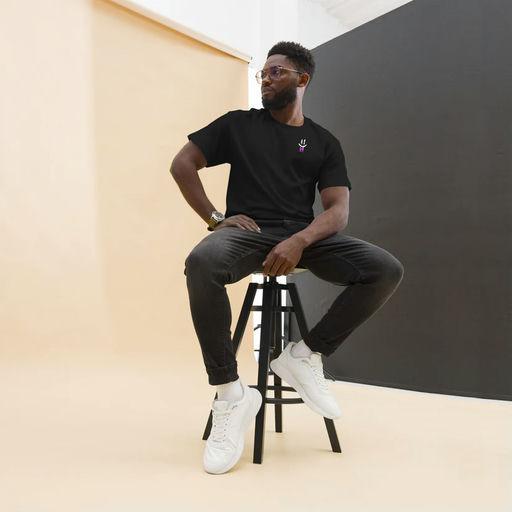 A man wearing Double B radiasi black t-shirt