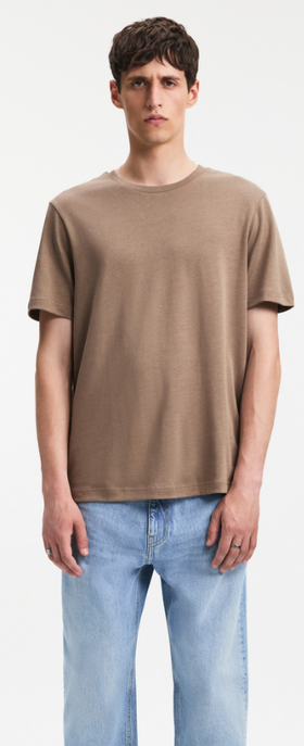 A man wearing A Day's March clay color nyx lyocell t-shirt