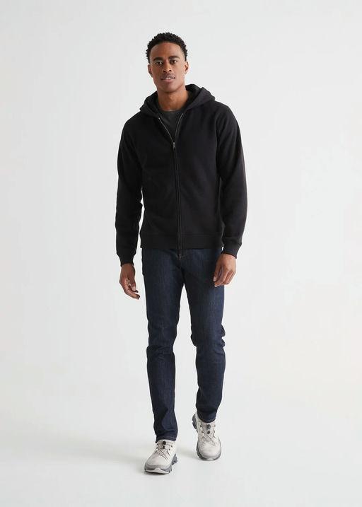 A man wearing DUER brushed terry performance zip up - black