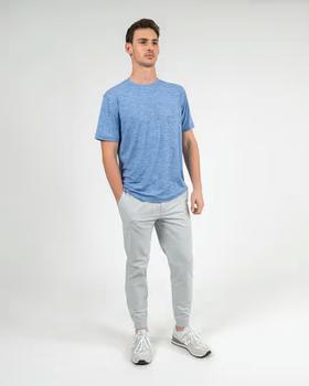 A man wearing Rhoback short sleeve tailwind performance tee