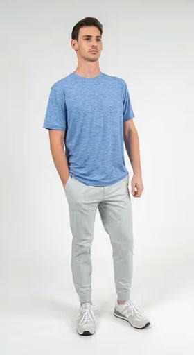 A man wearing Rhoback short sleeve tailwind performance tee