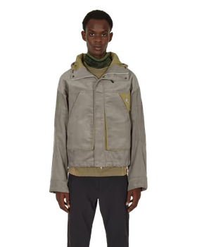 A man wearing ROA jacket and black pants