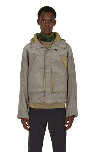 A man wearing ROA jacket and black pants