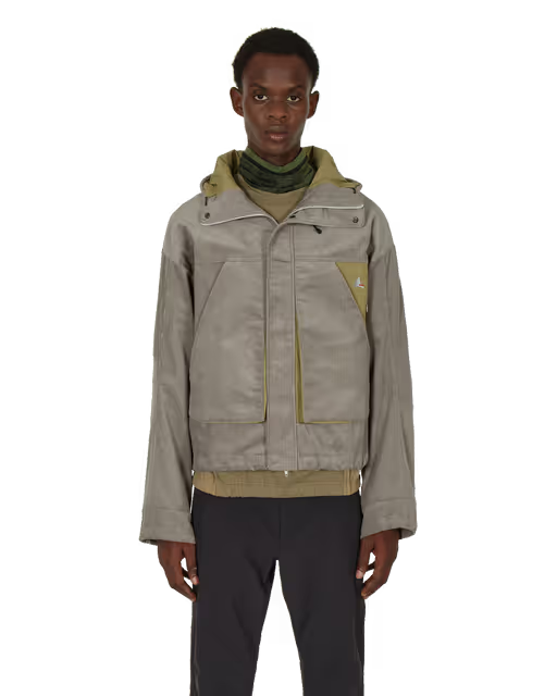 A man wearing ROA jacket and black pants