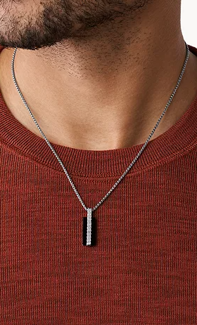 A man wearing Skagen torben stainless steel pendant necklace