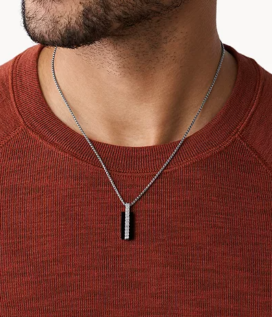 A man wearing Skagen torben stainless steel pendant necklace