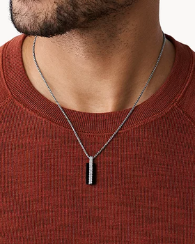 A man wearing Skagen torben stainless steel pendant necklace
