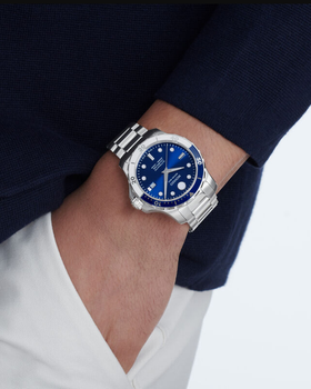 A man wearing series 800 automatic watch by Movado