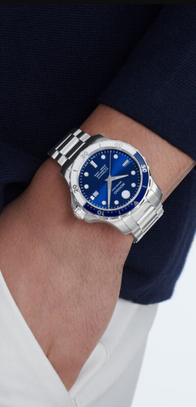 A man wearing series 800 automatic watch by Movado