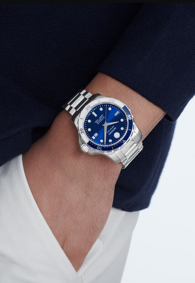 A man wearing series 800 automatic watch by Movado