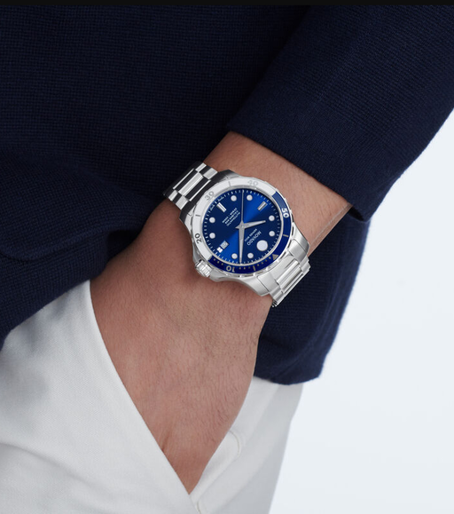 A man wearing series 800 automatic watch by Movado