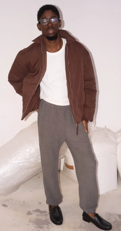 A man wearing Cotton Project sau paulo maroon puff jacket