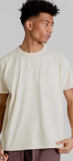A man wearing Velva Sheen pigment dye shirt