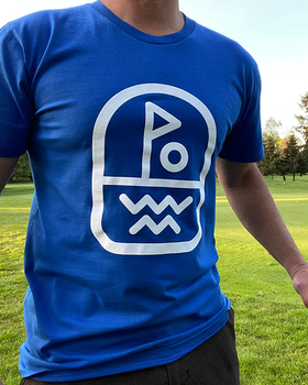 A man wearing Clinch Golf blue clinch 'flagstick' ss tee