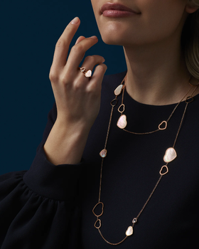 A woman wearing Chopard happy hearts ring
