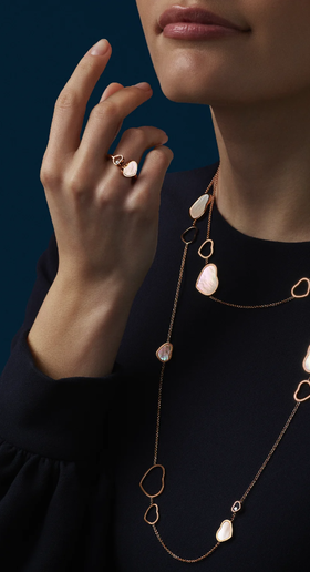 A woman wearing Chopard happy hearts ring