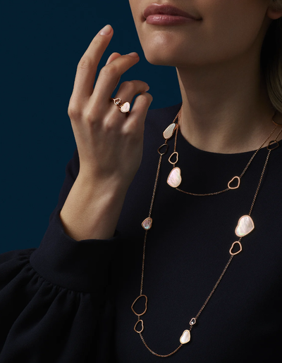 A woman wearing Chopard happy hearts ring