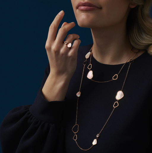 A woman wearing Chopard happy hearts ring