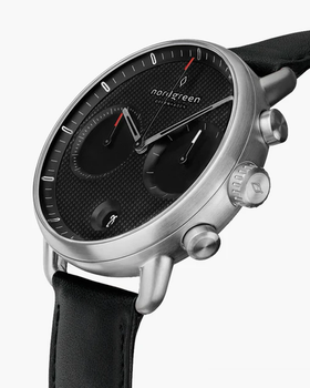 An image of Nordgreen pioneer watch with textured black dial - black leather