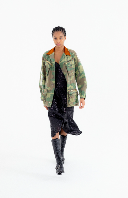 A woman wearing À La Garçonne sau paulo parka pintura a mão