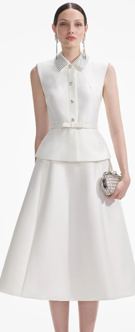 A woman wearing Self-Portrait cream taffeta diamante midi dress