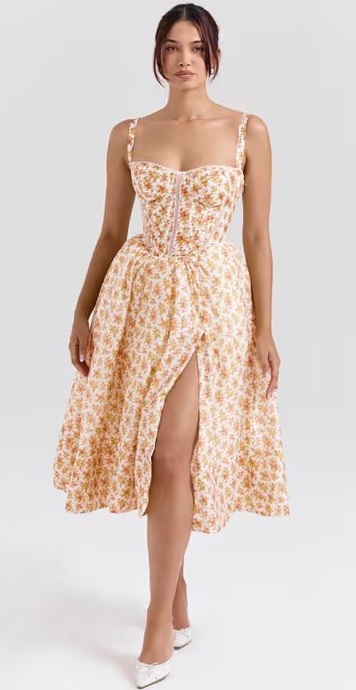 A woman wearing House of CB royal rose print corset midi sundress