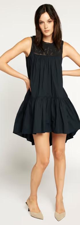 A woman wearing Joie black saga dress