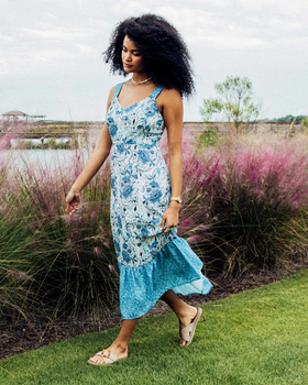 A woman wearing Olukai la‘I slide