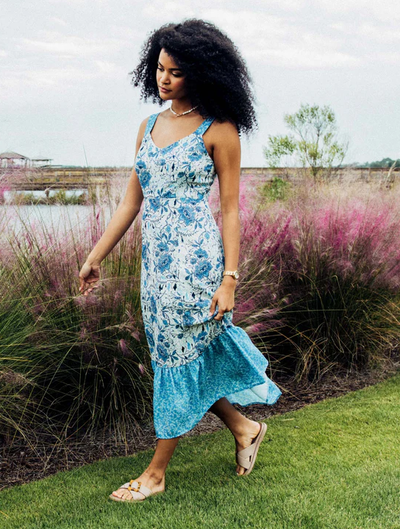 A woman wearing Olukai la‘I slide
