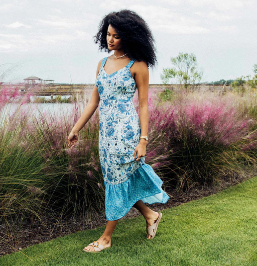 A woman wearing Olukai la‘I slide