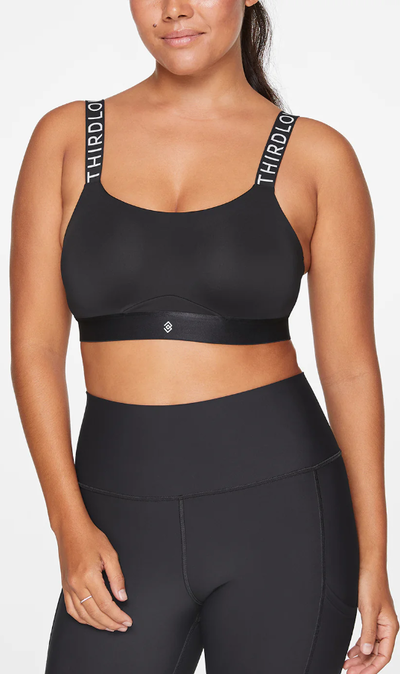 A woman wearing ThirdLove adjustable sports bra - black
