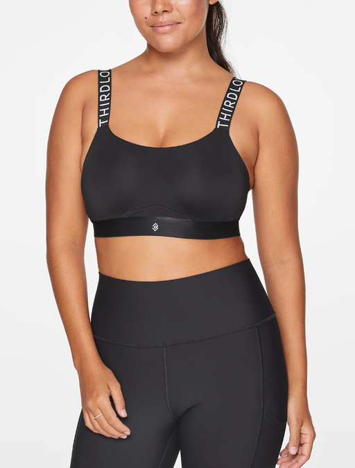 A woman wearing ThirdLove adjustable sports bra - black
