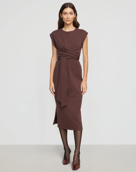 A woman wearing Modern Citizen mulberry color fei tie-front organic cotton dress