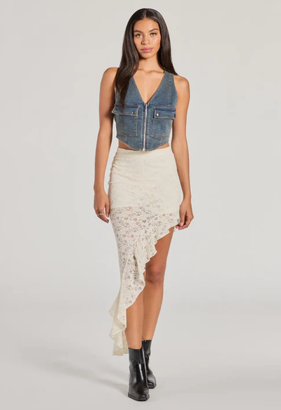 A woman wearing Windsor boho allure ruffled lace midi skirt