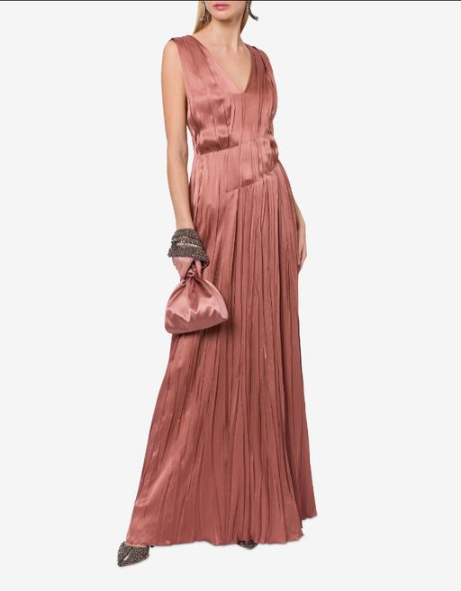 A woman wearing Alberta Ferretti powder pink satin long dress with pleats