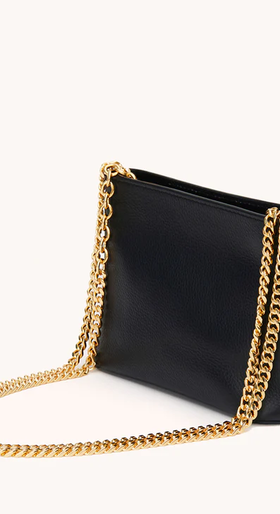 An image of Senreve black mini atlas pochette bag