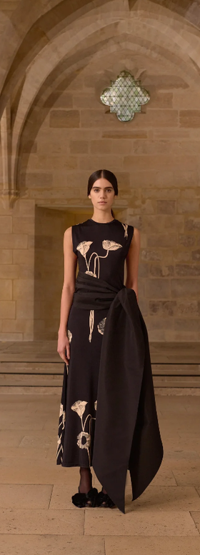 A woman wearing Johanna Ortiz oriental chronicles dress